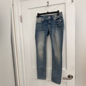 Miss Me light blue denim 8 1/2 inch rise jeans w/ angel wings on back (read)